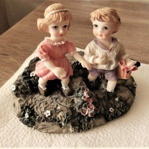 The Children taking a walk picking flowers Simulated porcelain figures